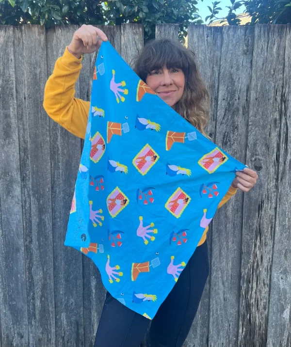 A person holding an Australiana Bandanna