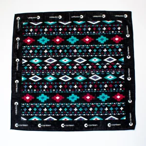 A wide shot photo of the Aztec bandana laid out flat