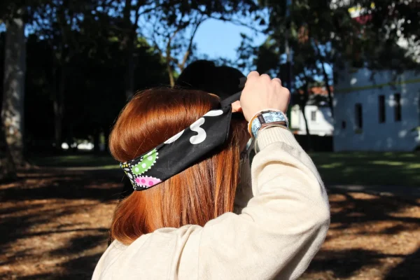 A person wearing the Family Connections bandanna