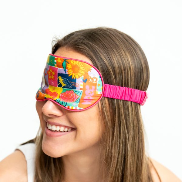 Young woman wearing Dannii Minogue x Canteen designed eye mask