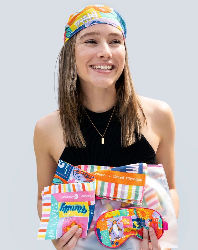 a girl holding the products from canteen's partnership with dannii minogue